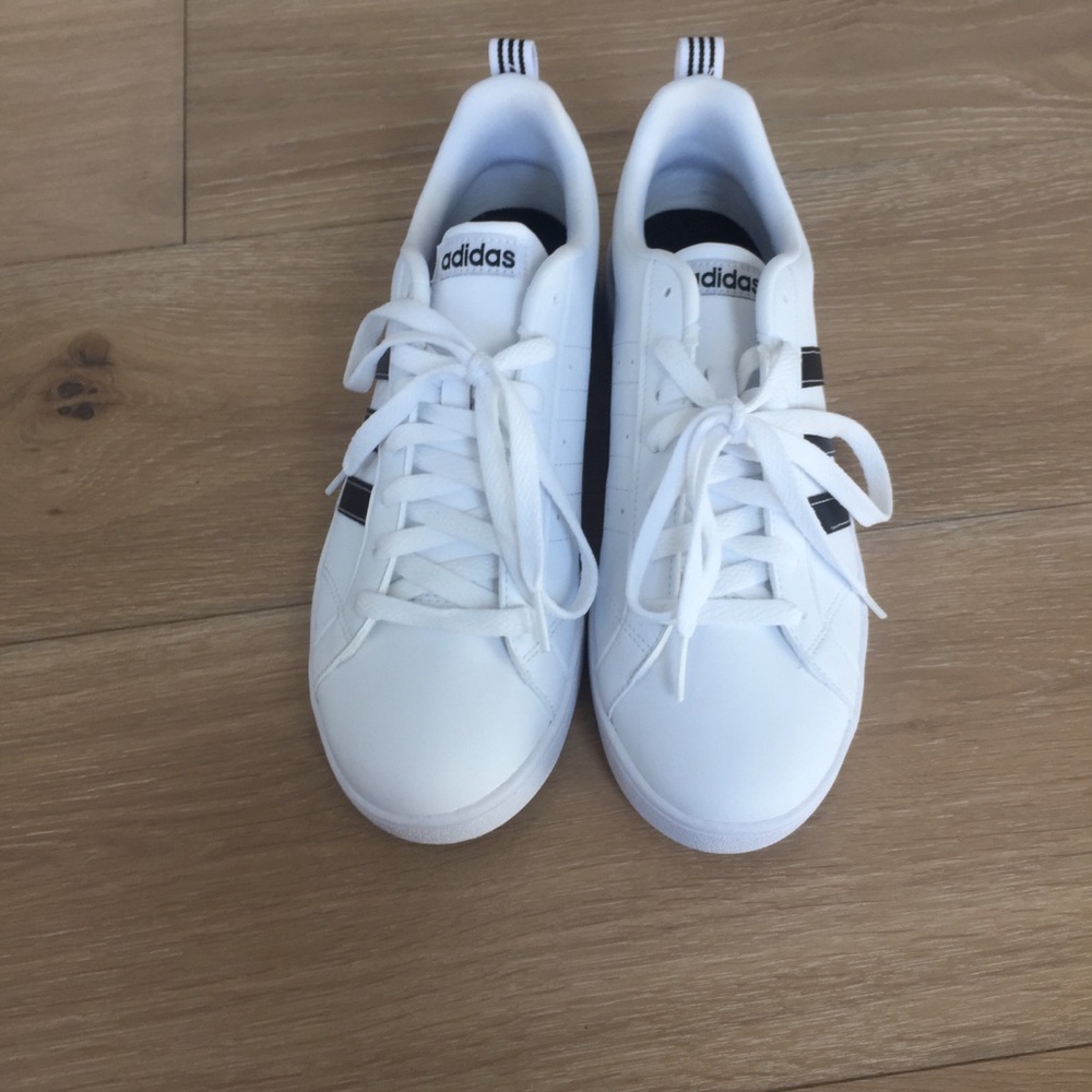 White Adidas sneakers with black stripe